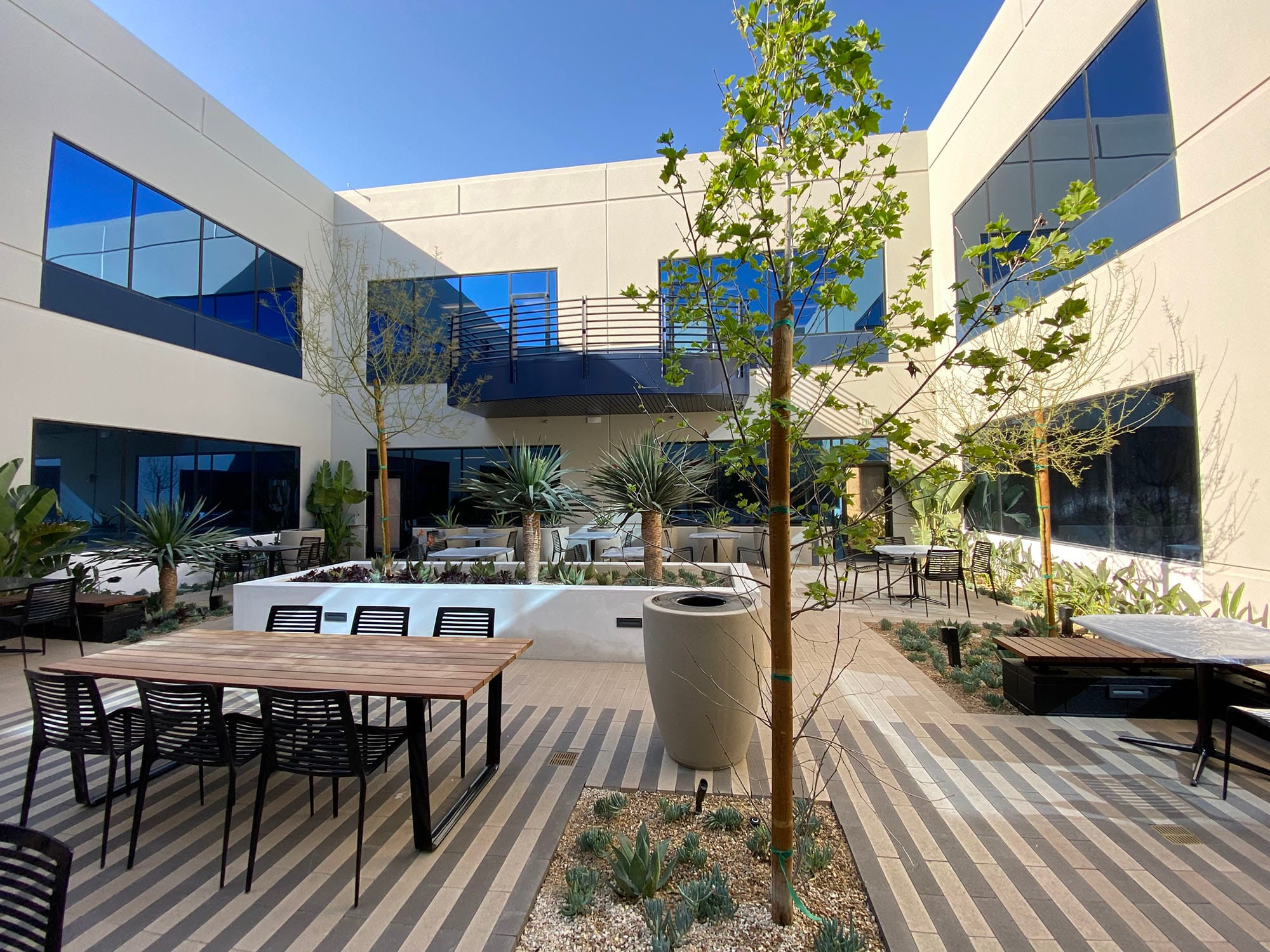 Courtyard with new hardscape, planters and outdoor seating